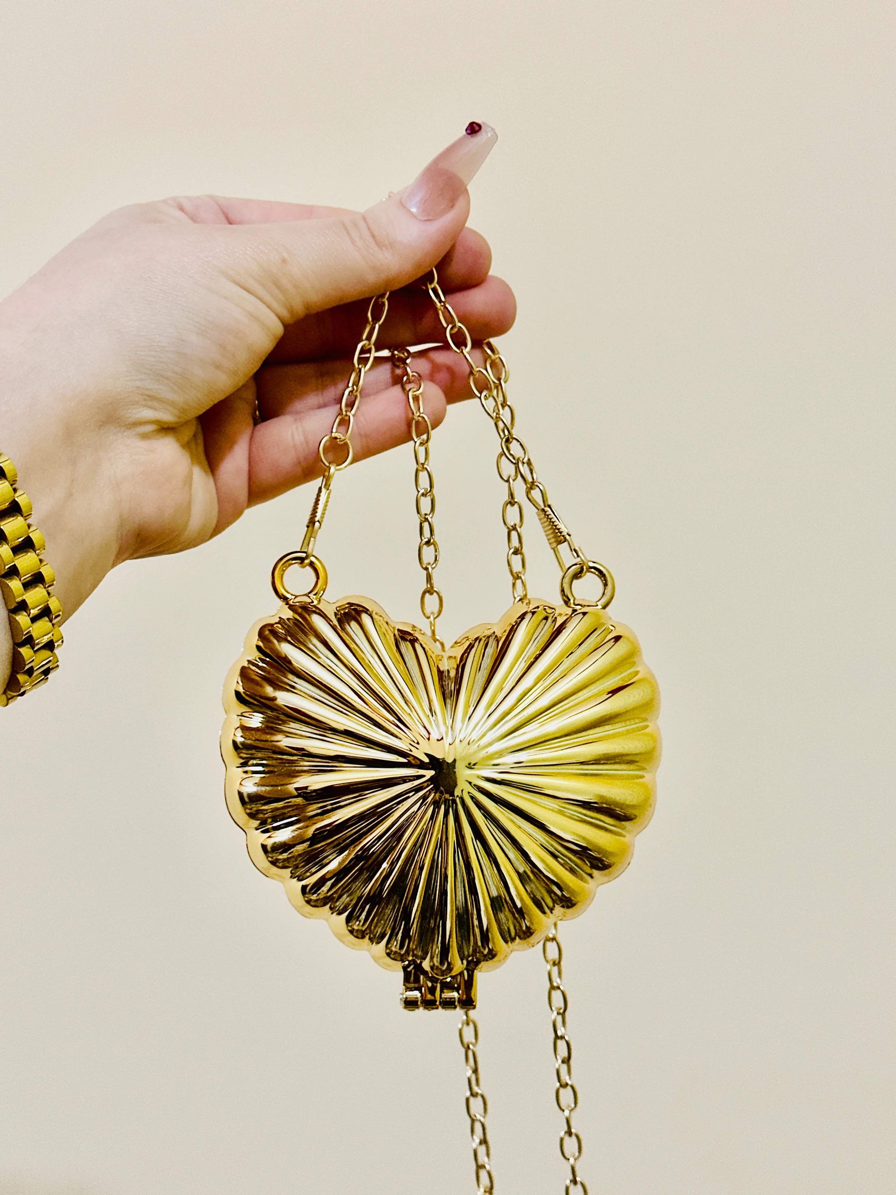 Golden heart clutch