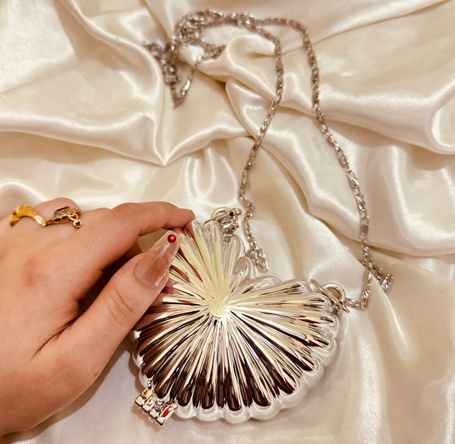 Golden heart clutch