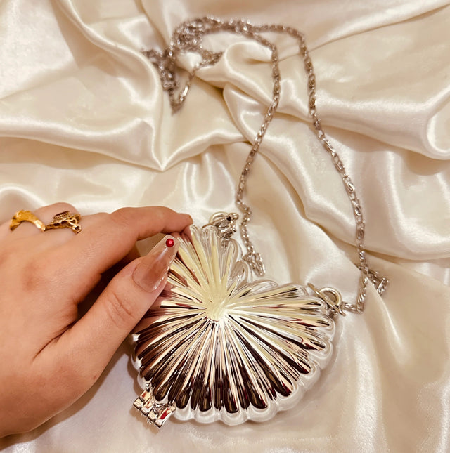 Golden heart clutch