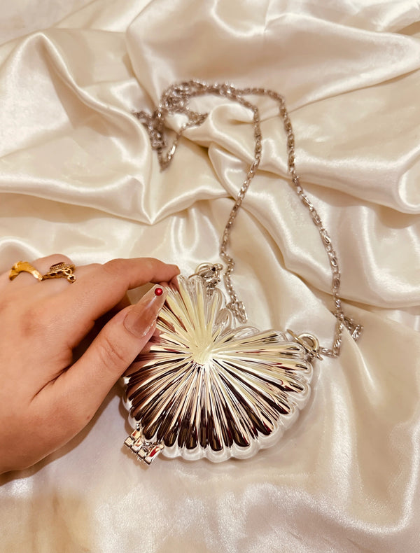 Golden heart clutch