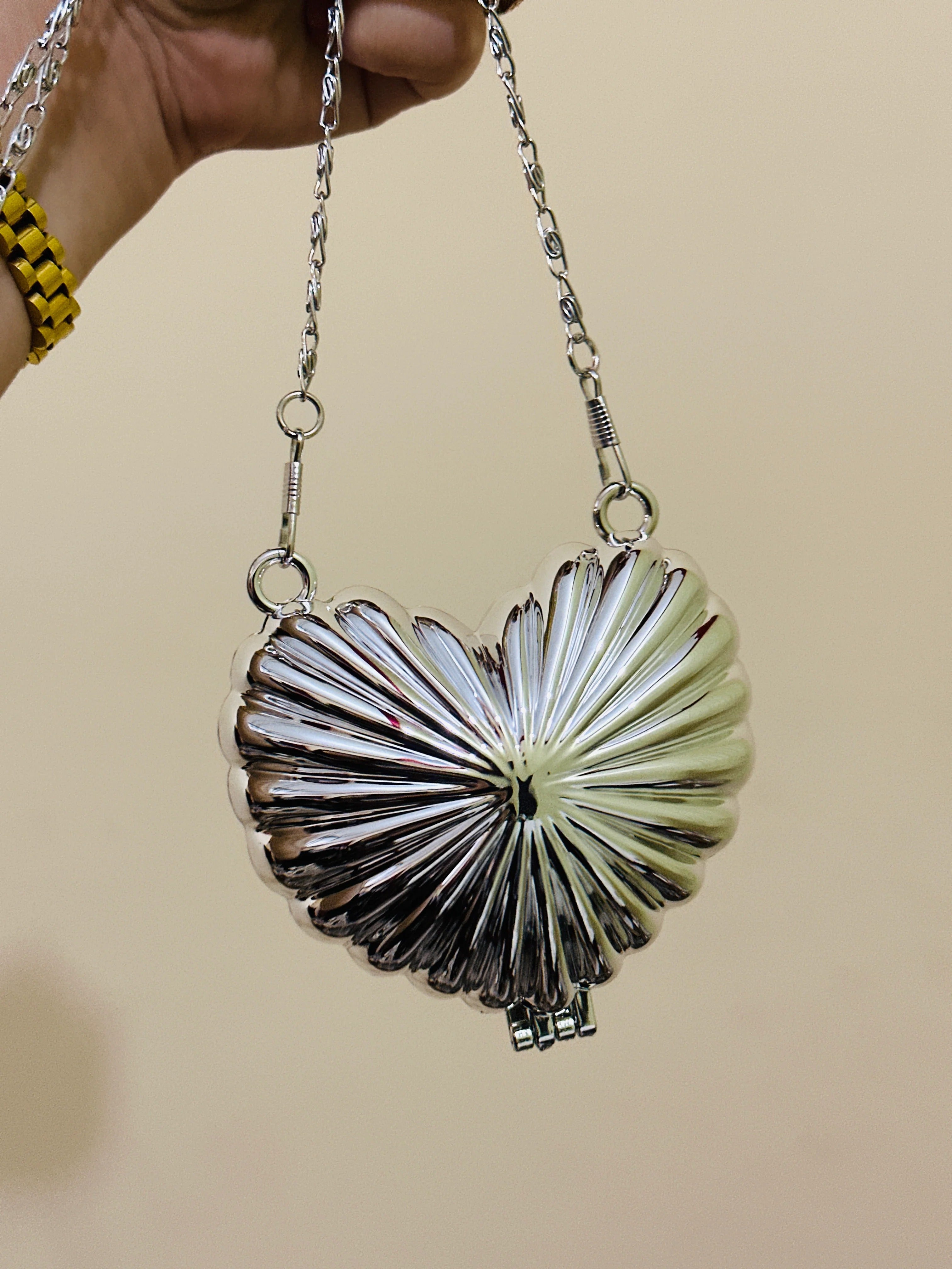 Golden heart clutch